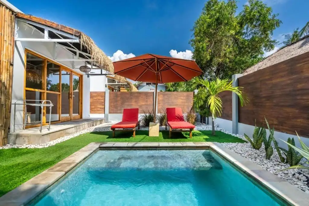 Pool deck and glass doors of the villa